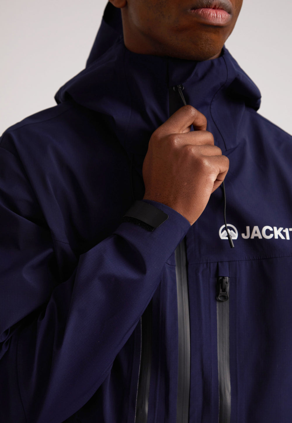 navy lithium waterproof mens jacket close-up showing durable fabric and design features for outdoor protection
