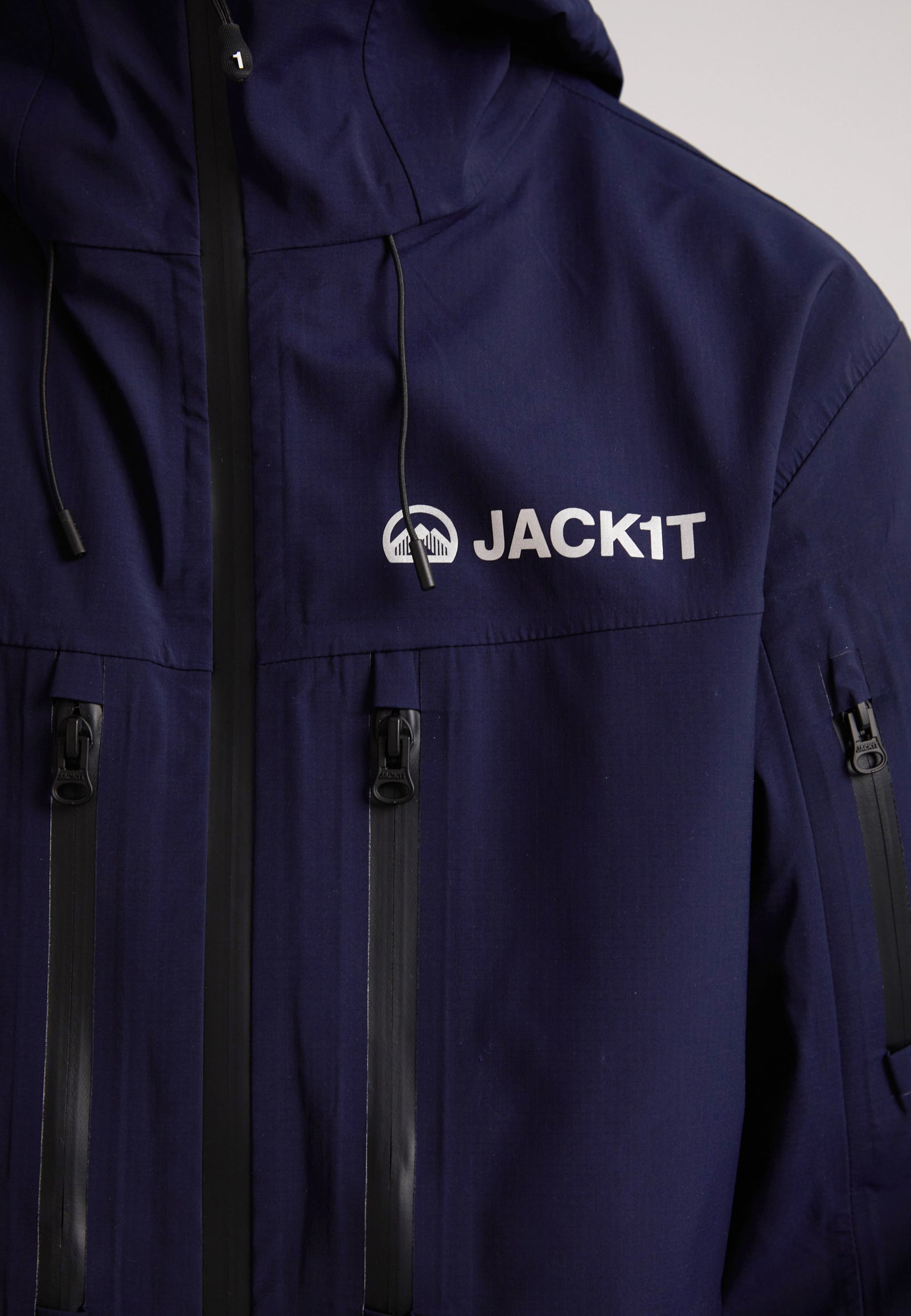 navy lithium waterproof mens jacket featuring a modern design and multiple zippered pockets for outdoor adventures.