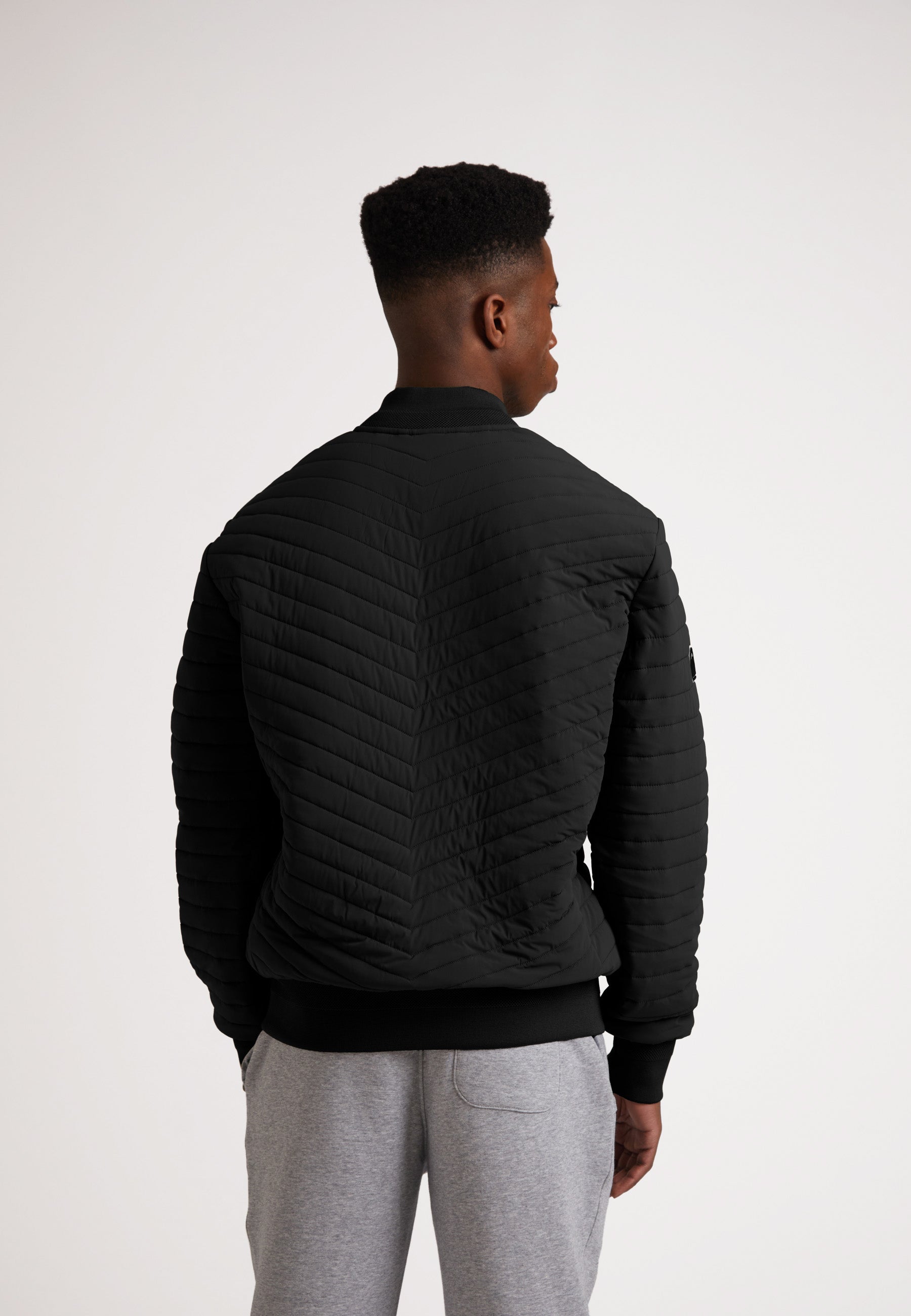 PING ブラックジャケット THERMOLITE Thermolite Bomber Jacket in Black | JACK1T