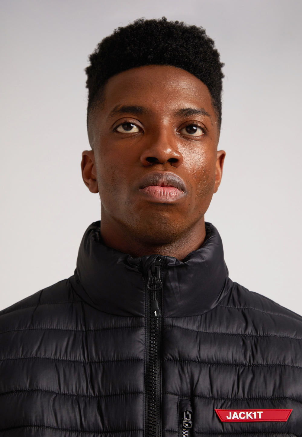 Model wearing the SATEL1TE Lightweight Puffer Gilet 2.0 Black showcasing its stylish design and comfort.