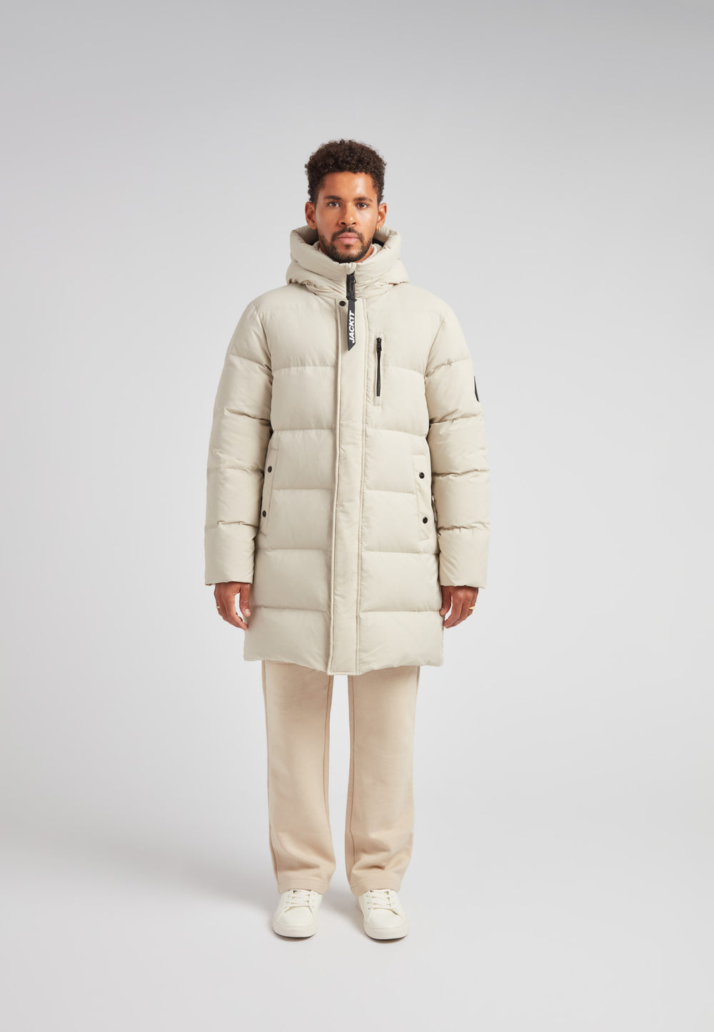 Stone Nomad Down Parka Coat for Men in a structured silhouette, providing warmth and winter protection.