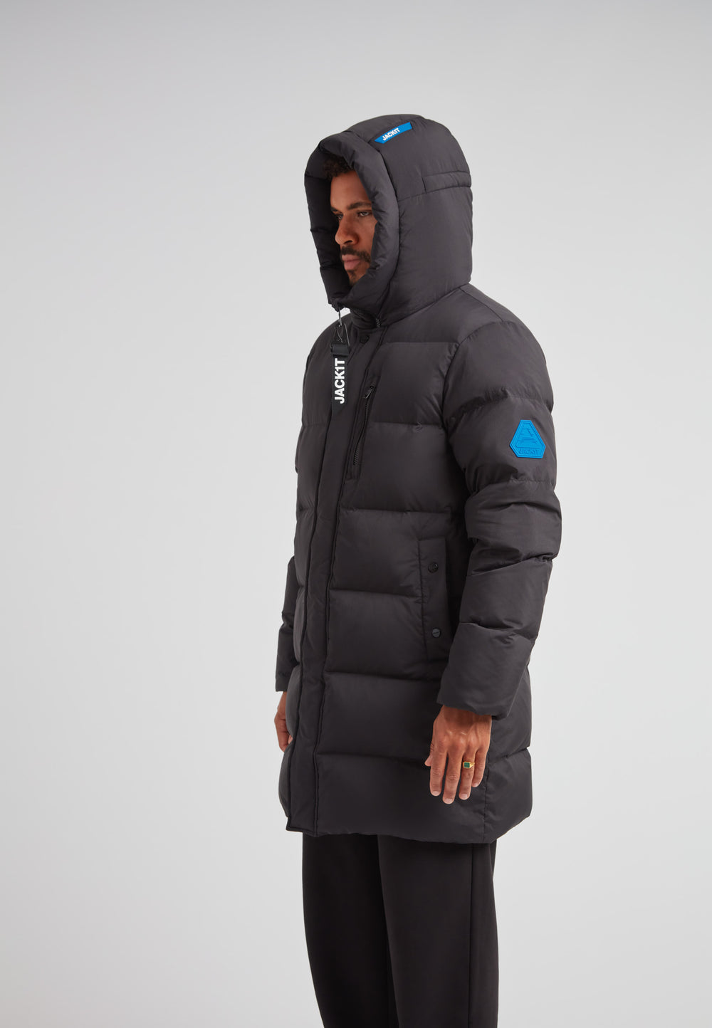 Down Parka Coat for Men in Black, featuring hood and pockets for winter protection.