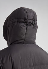 Close-up of the adjustable hood on the Nomad Mens Extra Long Puffer Coat in Black.