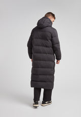 Mens Extra Long Puffer Coat in Black worn from the back, featuring a hood and puffy quilted design.