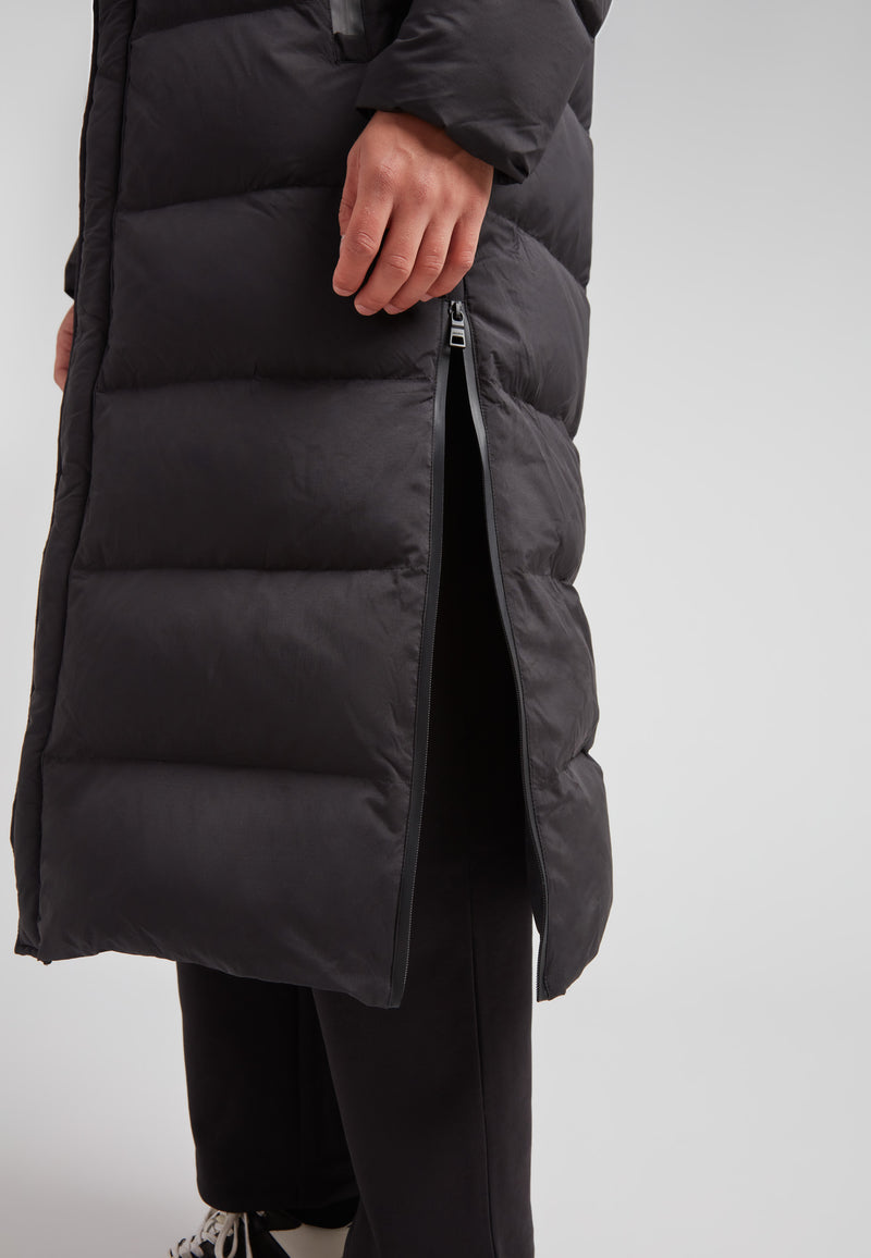 Mens Extra Long Puffer Coat in Black showcasing the side zip and puffer design for warmth and style.