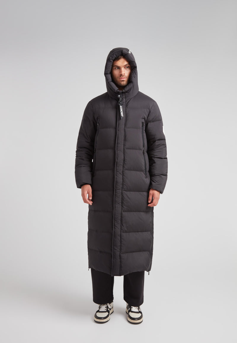 Mens Extra Long Puffer Coat in Black worn by model, showcasing its stylish and warm design.