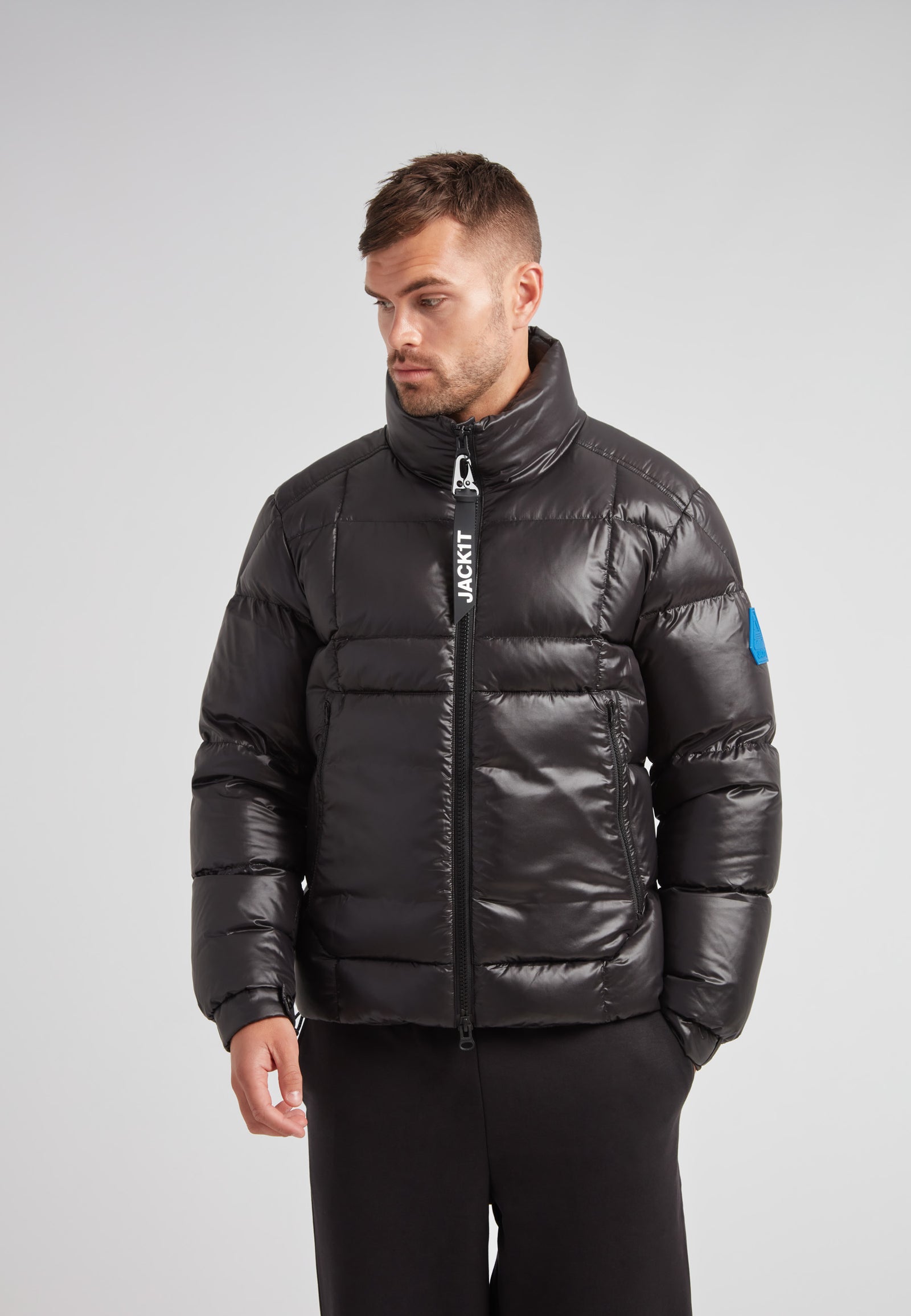EZ Boxed Funnel Puffer Jacket Lux Black featured on a model, showcasing its sleek design and winter functionality.