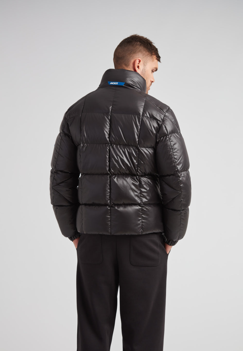 EZ Boxed Funnel Puffer Jacket Lux Black back view showcasing stylish puffer design and funnel neck.