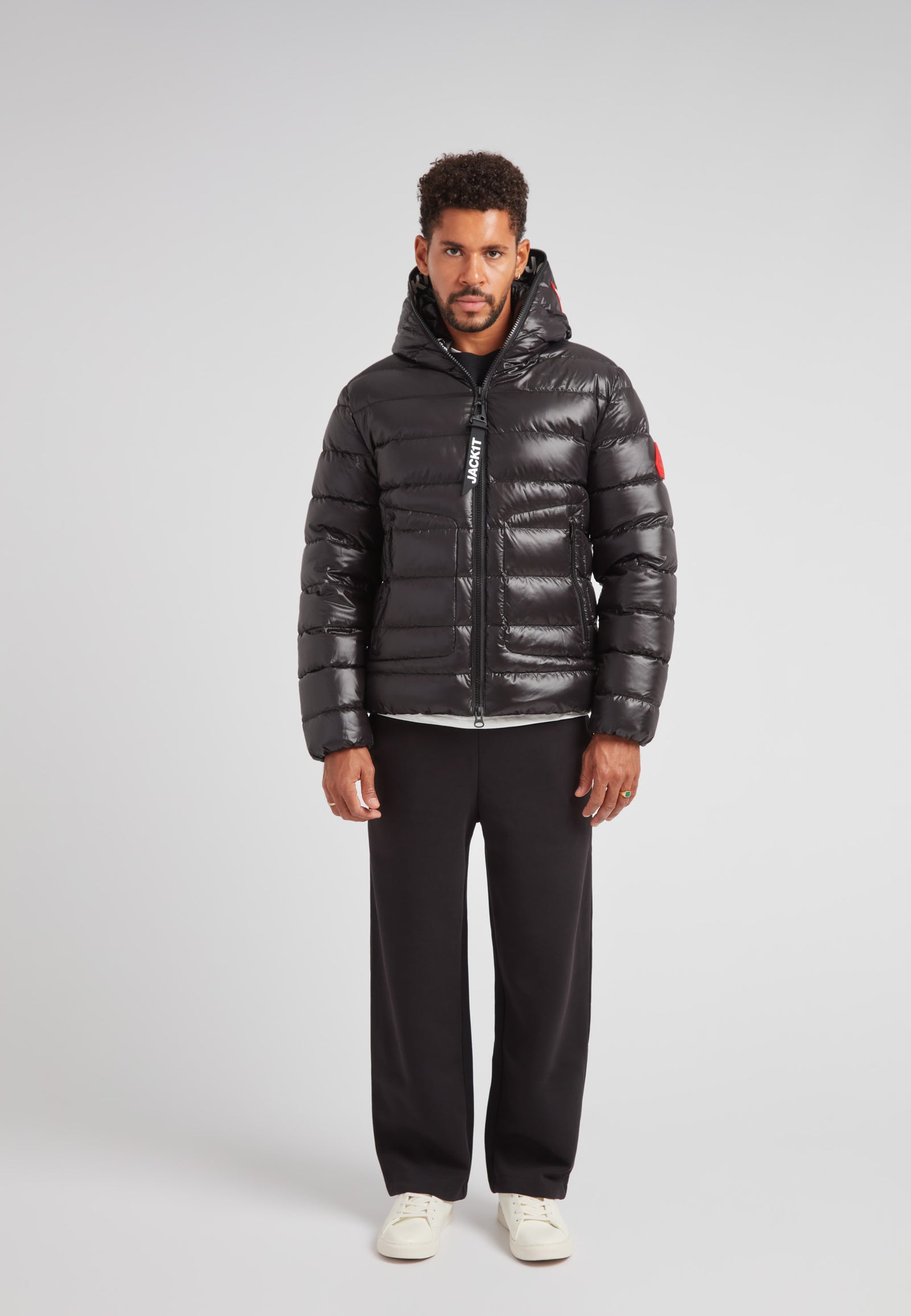 R4D Tramline Puffer Racer Jacket Lux Black worn by model, showcasing stylish and technical outerwear.