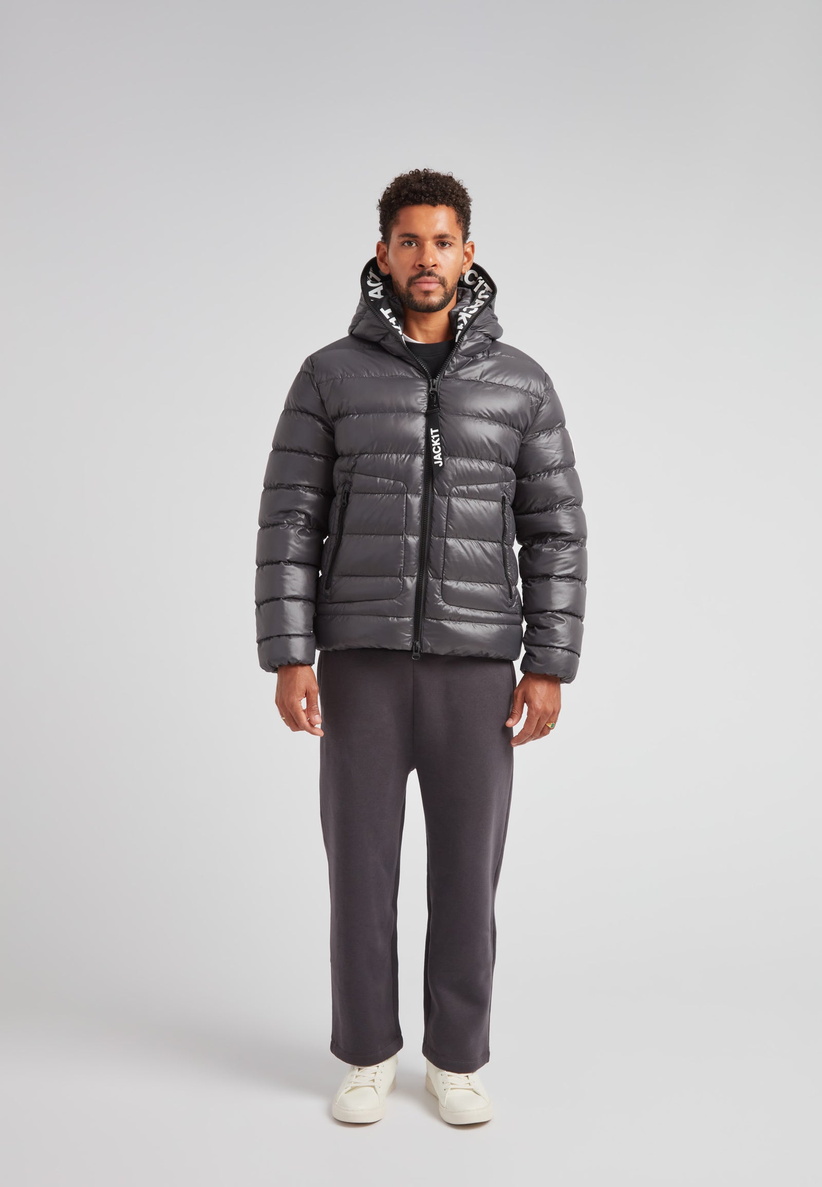 R4D Tramline Puffer Racer Jacket Lux Graphite worn by a model, showcasing its sleek design and comfort.
