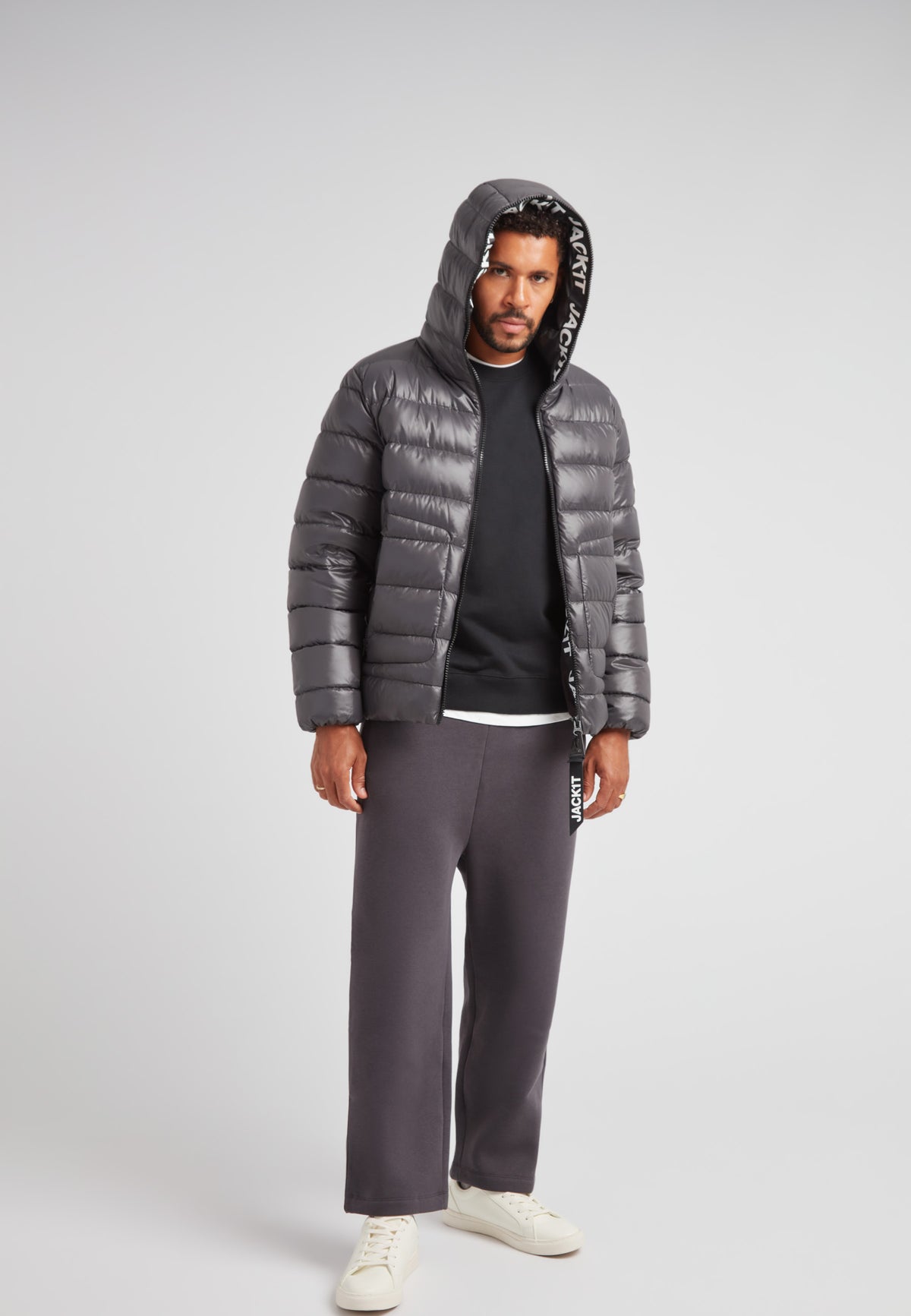 R4D Tramline Puffer Racer Jacket Lux Graphite worn by model, showcasing its stylish design and modern fit.