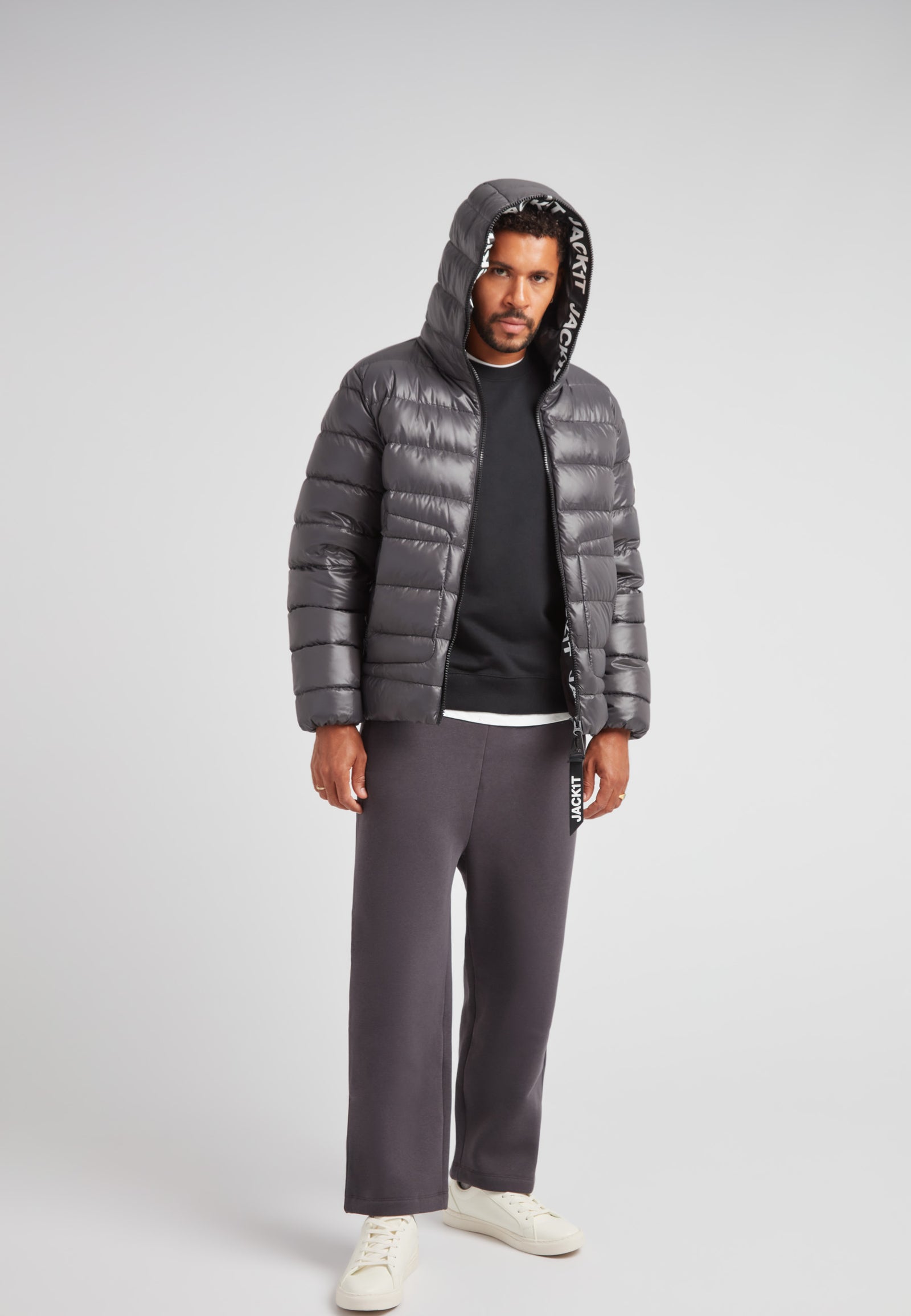 R4D Tramline Puffer Racer Jacket Lux Graphite worn by model, showcasing its stylish design and modern fit.
