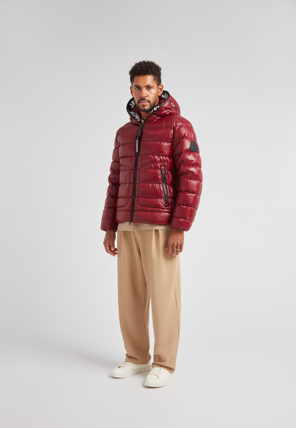 R4D Tramline Puffer Racer Jacket Lux Red worn by a model, showcasing its sleek design and vibrant color.