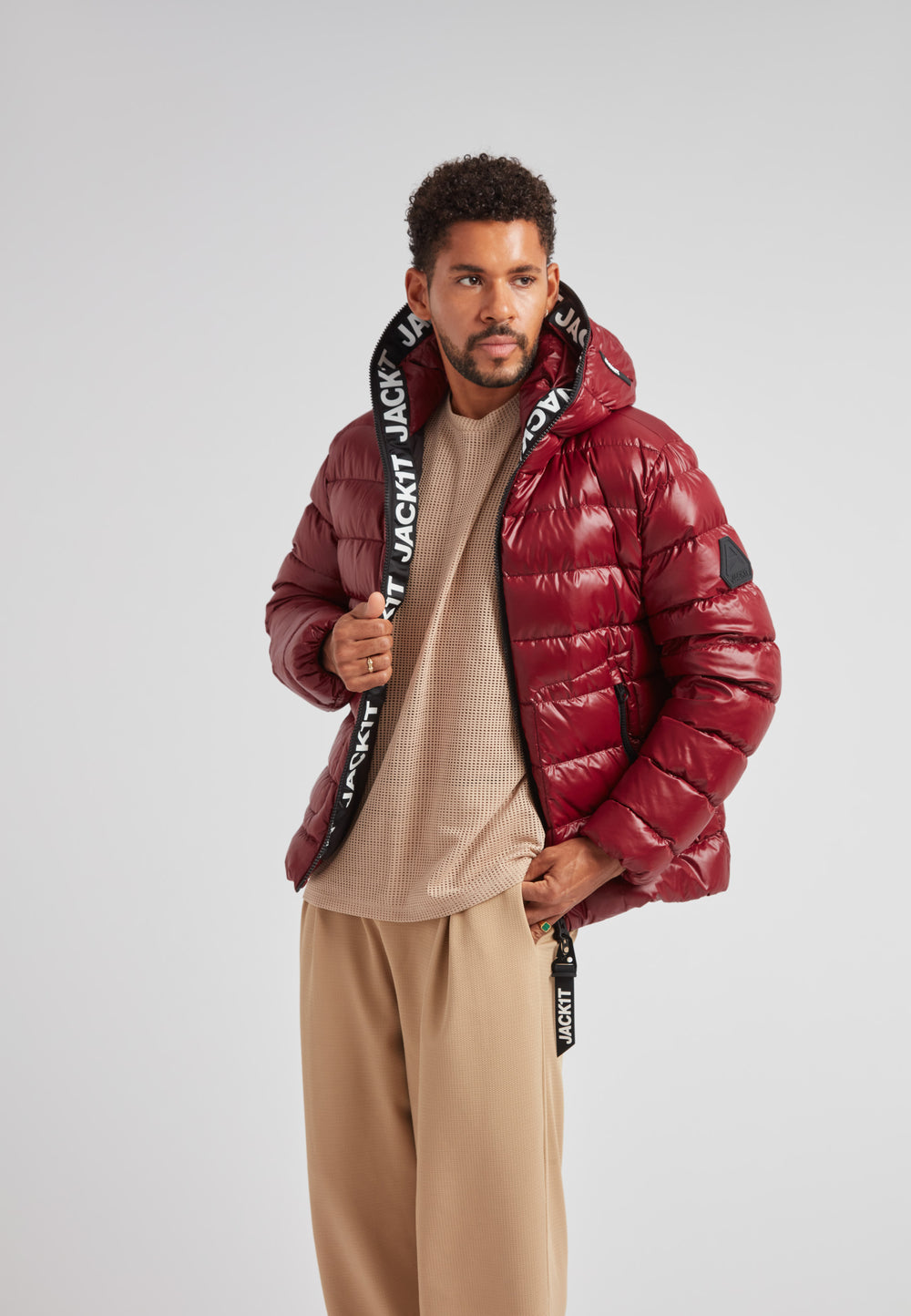 R4D Tramline Puffer Racer Jacket Lux Red worn by a model with a stylish pose against a neutral background.
