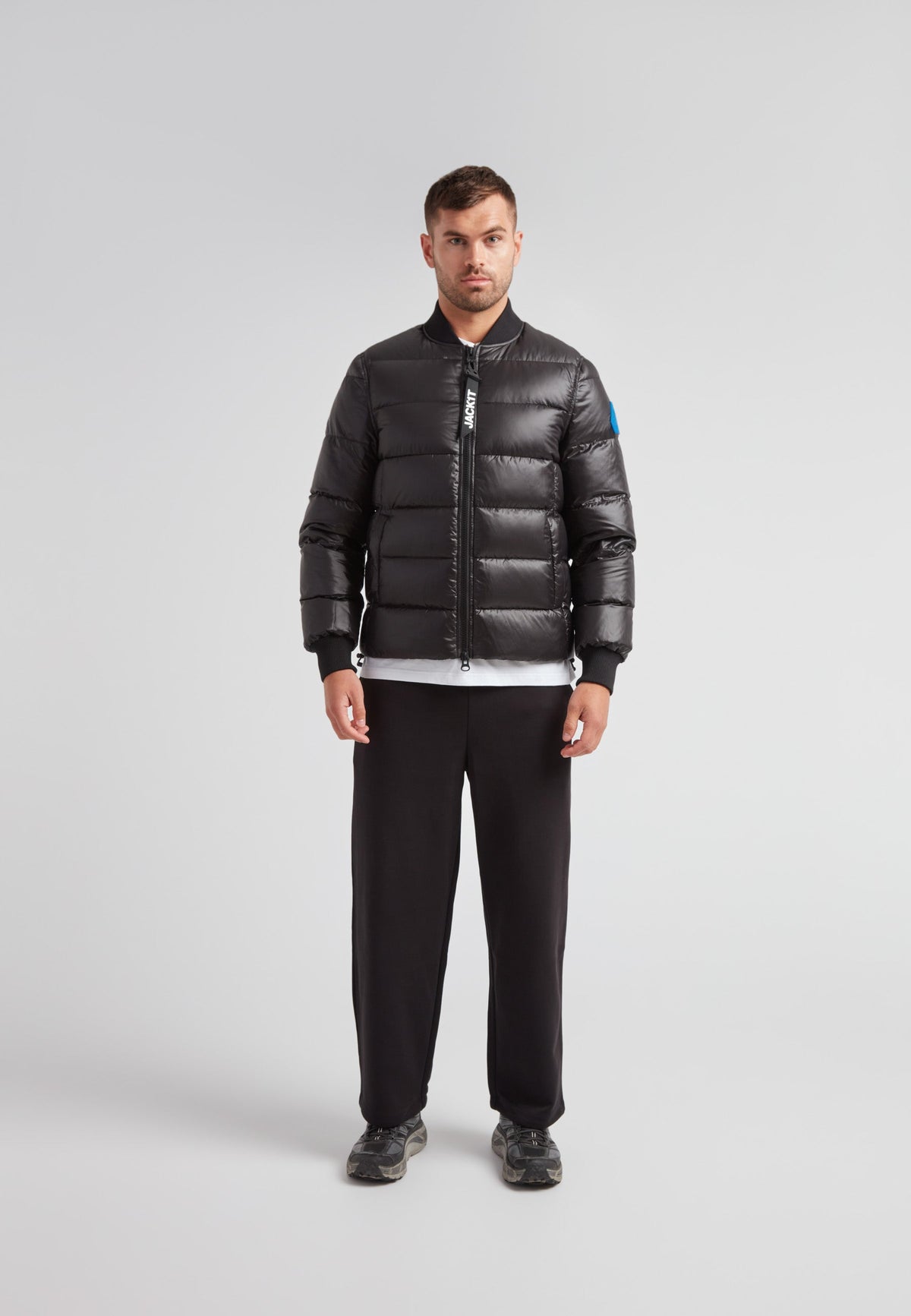 Vortex Black Bomber Jacket displayed on a model, featuring a durable nylon shell and modern design.