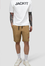 Men's sand summer shorts with elastic waist, relaxed fit, paired with a white t-shirt and casual shoes.