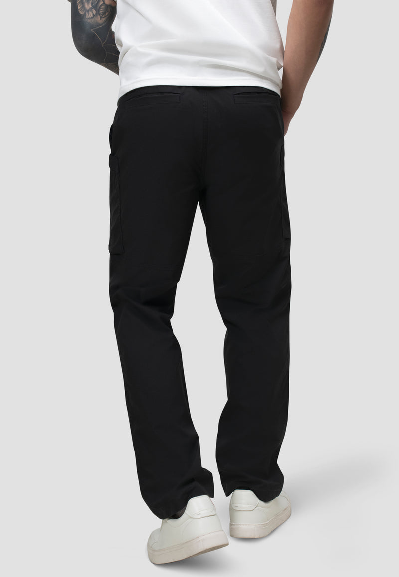 Men's black cargo trousers showing a relaxed fit and elasticated waistband from the back, ideal for casual wear.