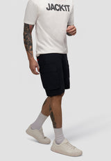 Man wearing men's navy cargo shorts with utility pockets paired with a casual t-shirt and sneakers.