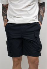 Men's navy cargo shorts with utility-inspired fit, featuring pockets and an elastic waistband.