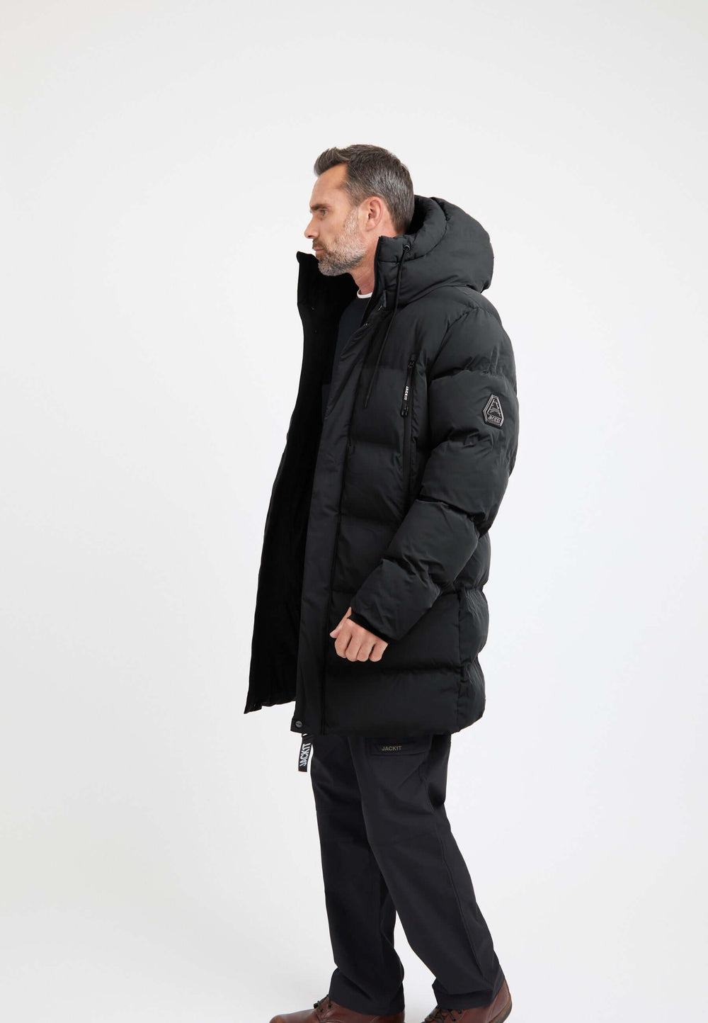 Supremo Coat Black on model back view by JACK1T