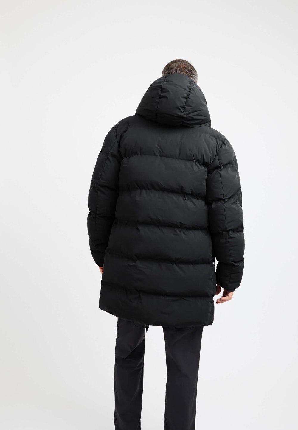 Supremo Coat Black on model full length by JACK1T