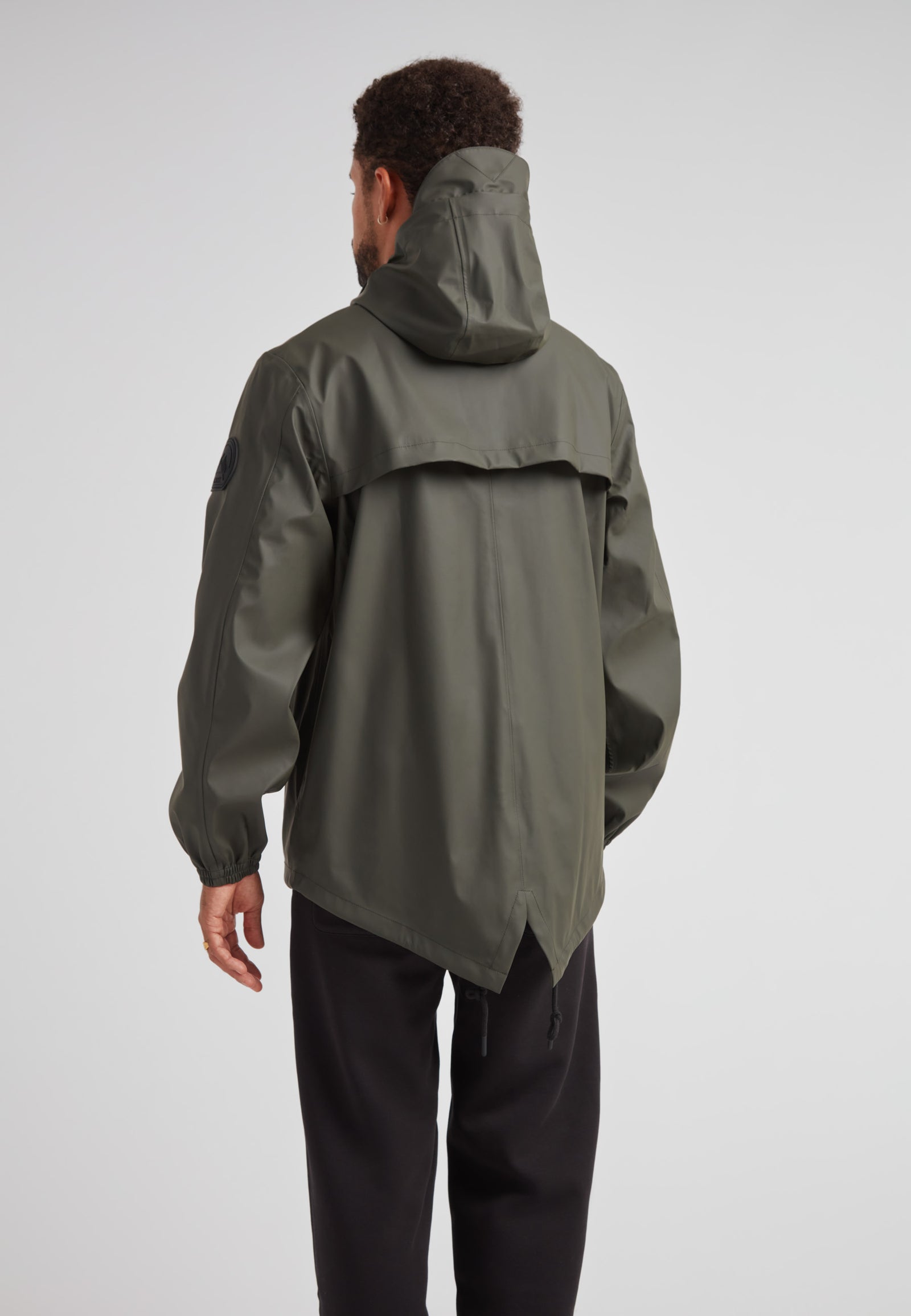 ELEMENTS Unisex Raincoat 2.0 Khaki showcased from the back, demonstrating its lightweight design and weather protection.