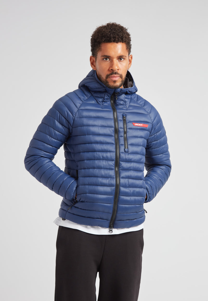 SATEL1TE hooded jacket 2.0 pacific blue worn by a model, showcasing its stylish design and performance features.