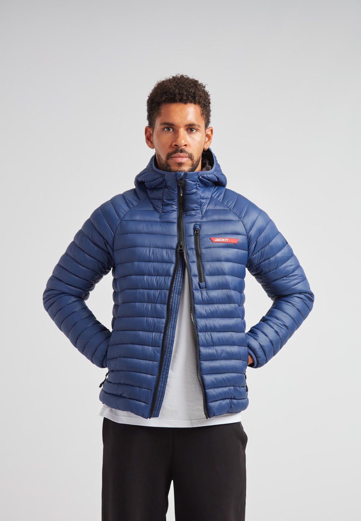 SATEL1TE hooded jacket 2.0 pacific blue displayed on a model showcasing its stylish, packed design.