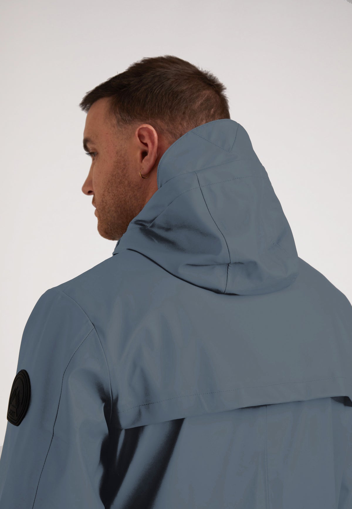 Back view of a model wearing the ELEMENTS Unisex Raincoat 2.0 Grey with a hood.