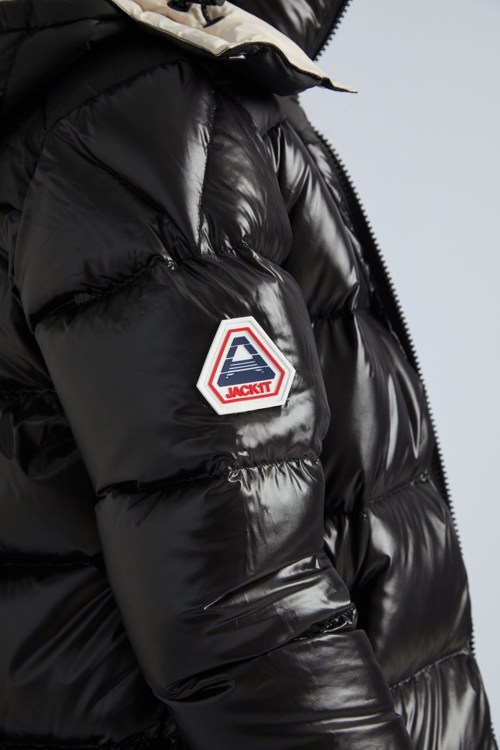 Shop Women's Front Runner Slick Puffer Jacket in Black/Stone