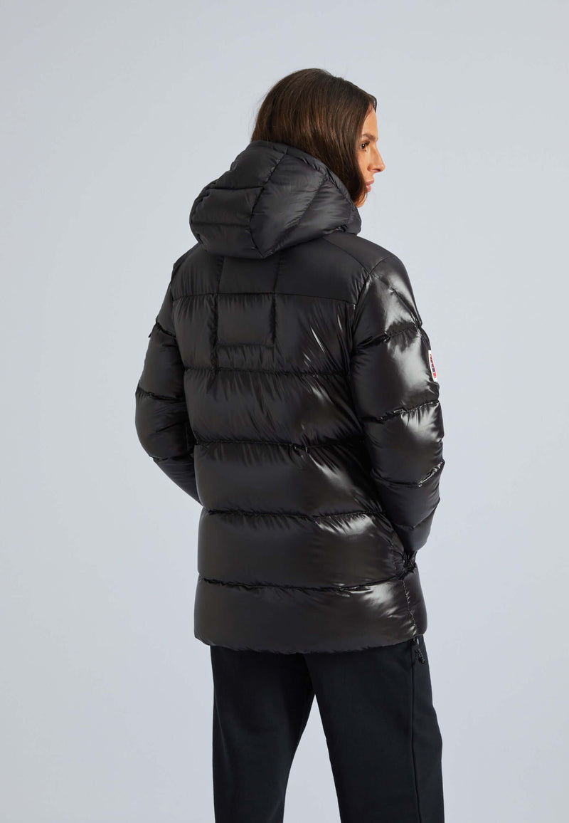 Women's black puffer with removable hood, showing stylish back view in lightweight design.