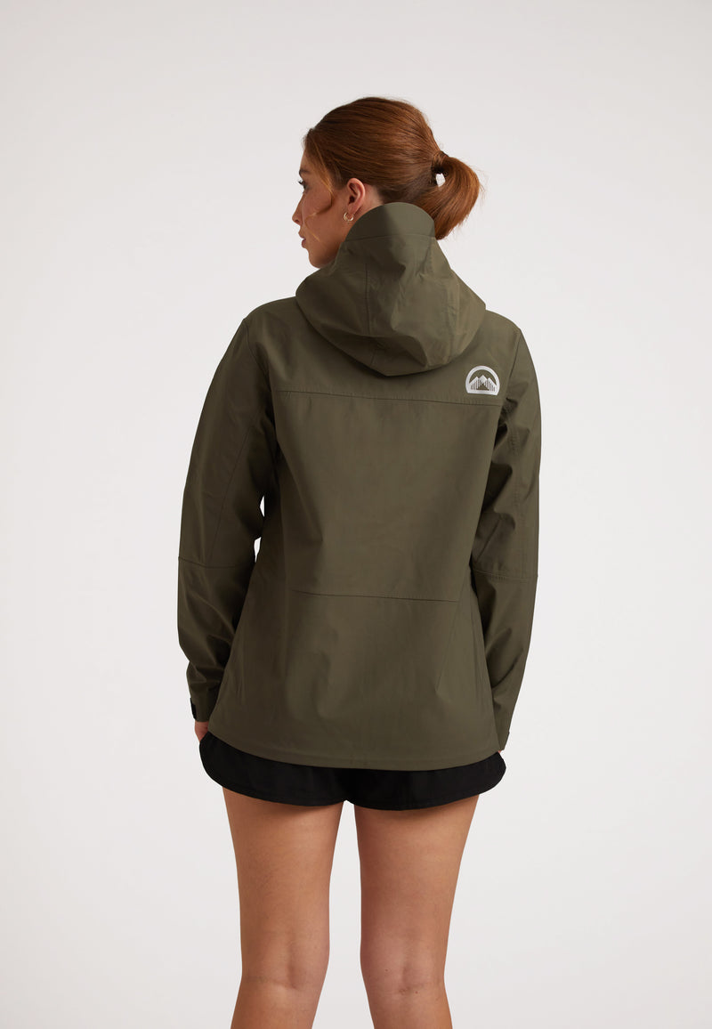 Back view of a woman wearing a LITHIUM Waterproof ladies jacket in olive with a hood.