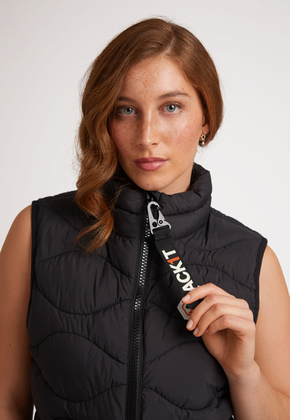 Model wearing ORB1T Quilted Gilet Black, featuring onion baffling and a sleek design.