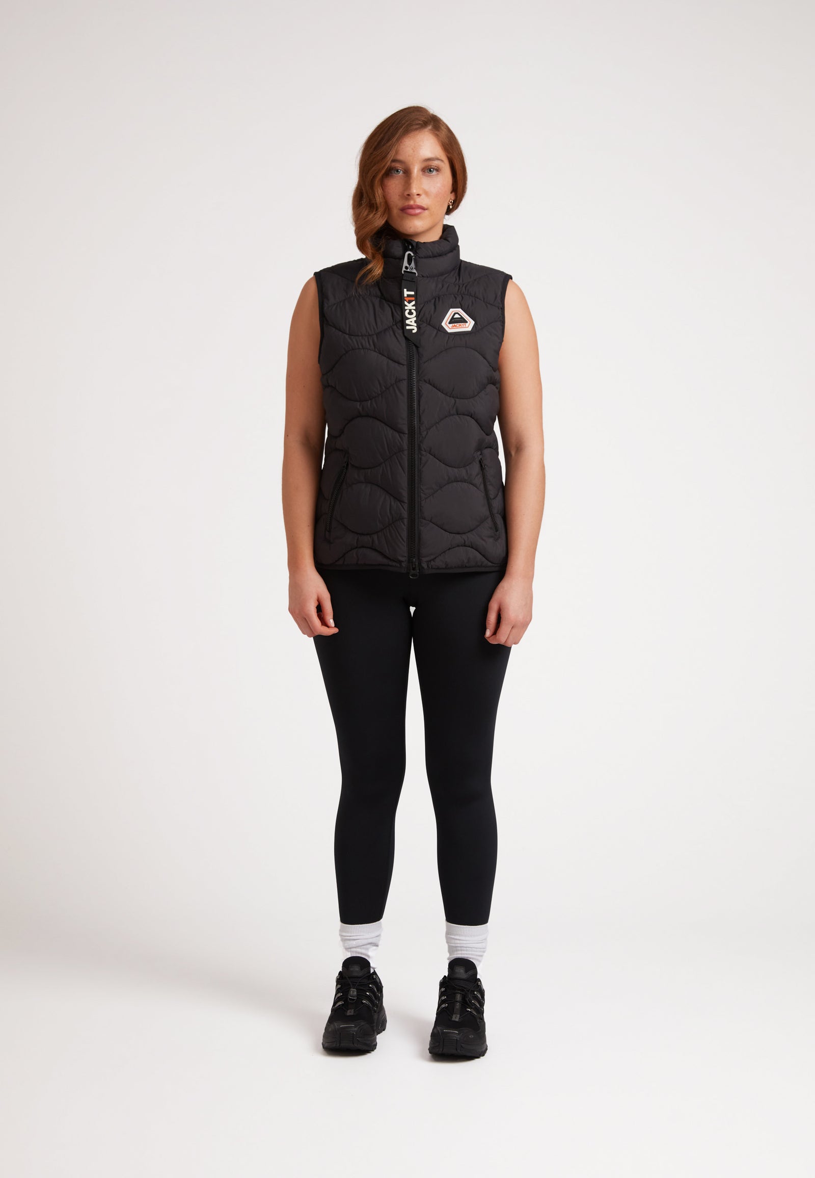 Model wearing the ORB1T Quilted Gilet Black, showcasing its modern design and lightweight warmth.