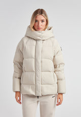Cloud Prime Longline Down Puffer Jacket Stone displayed on a model wearing a light, stylish winter jacket.