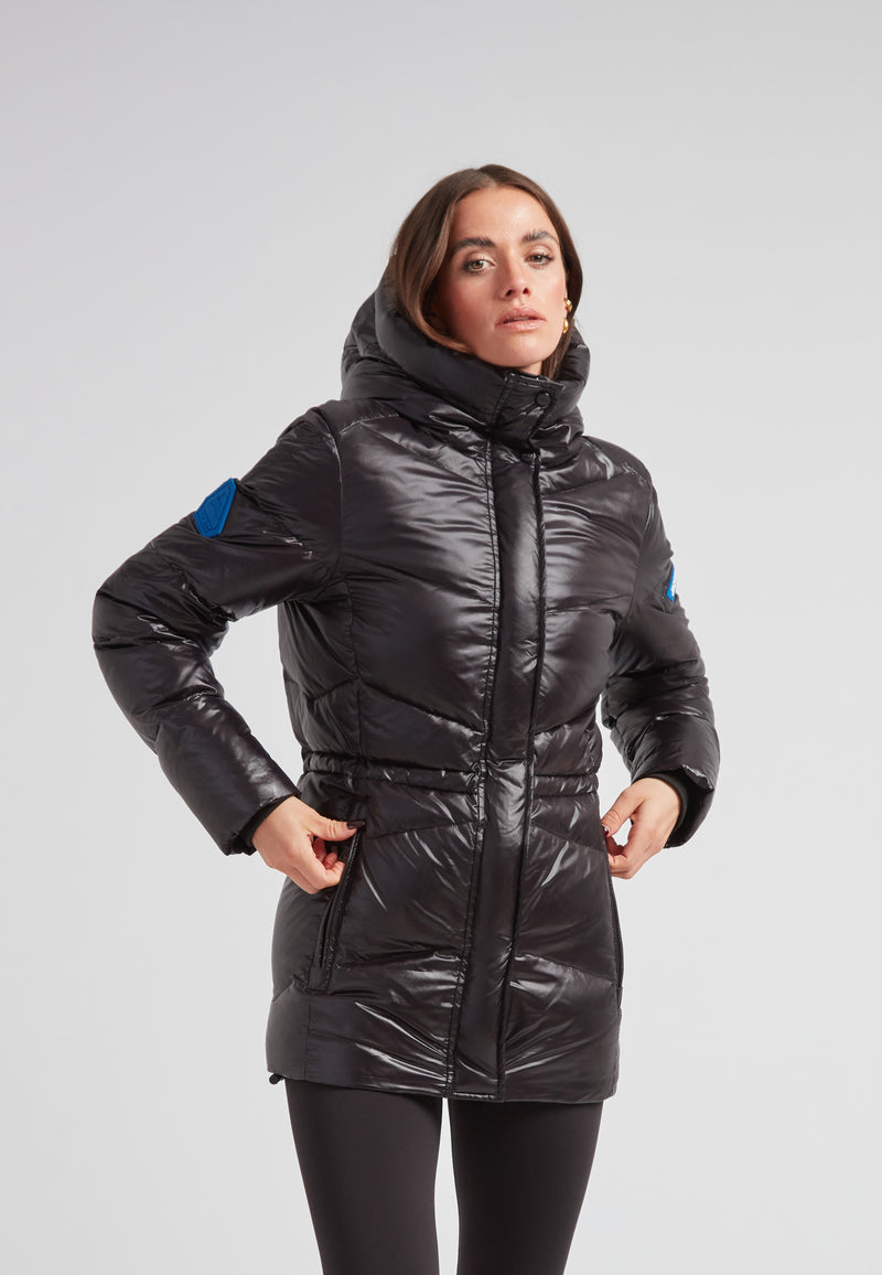 Black thigh-length womens slick coat with adjustable hem and RDS-certified down insulation.