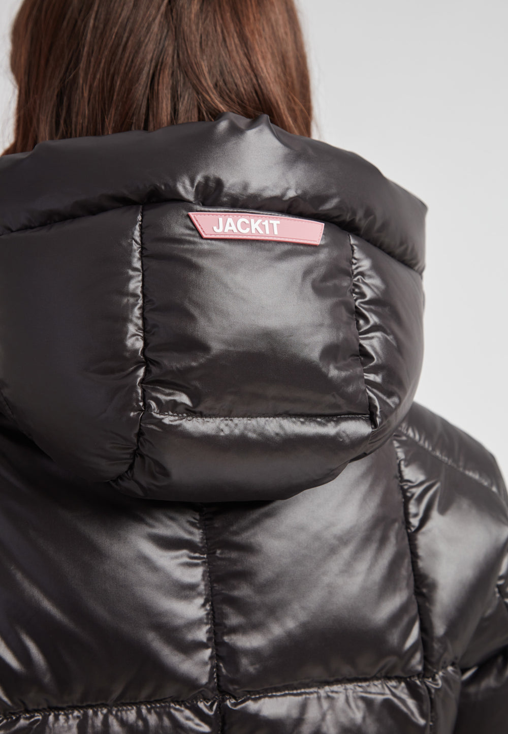 EZ Boxed Crop Down Puffer Jacket Lux Black showcasing the sleek hood and brand detail on the back, perfect for winter styling.