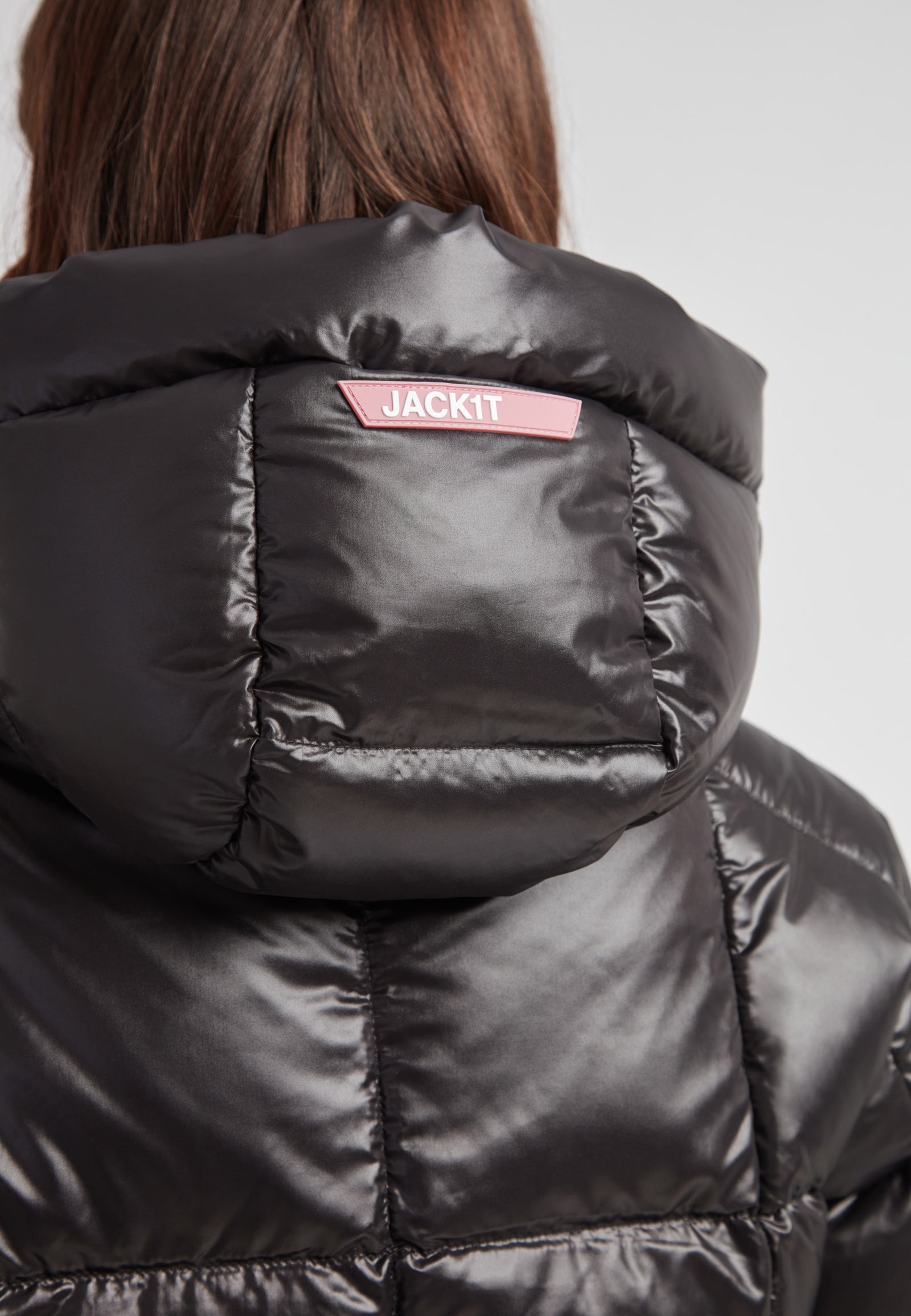 EZ Boxed Crop Down Puffer Jacket Lux Black showcasing the sleek hood and brand detail on the back, perfect for winter styling.