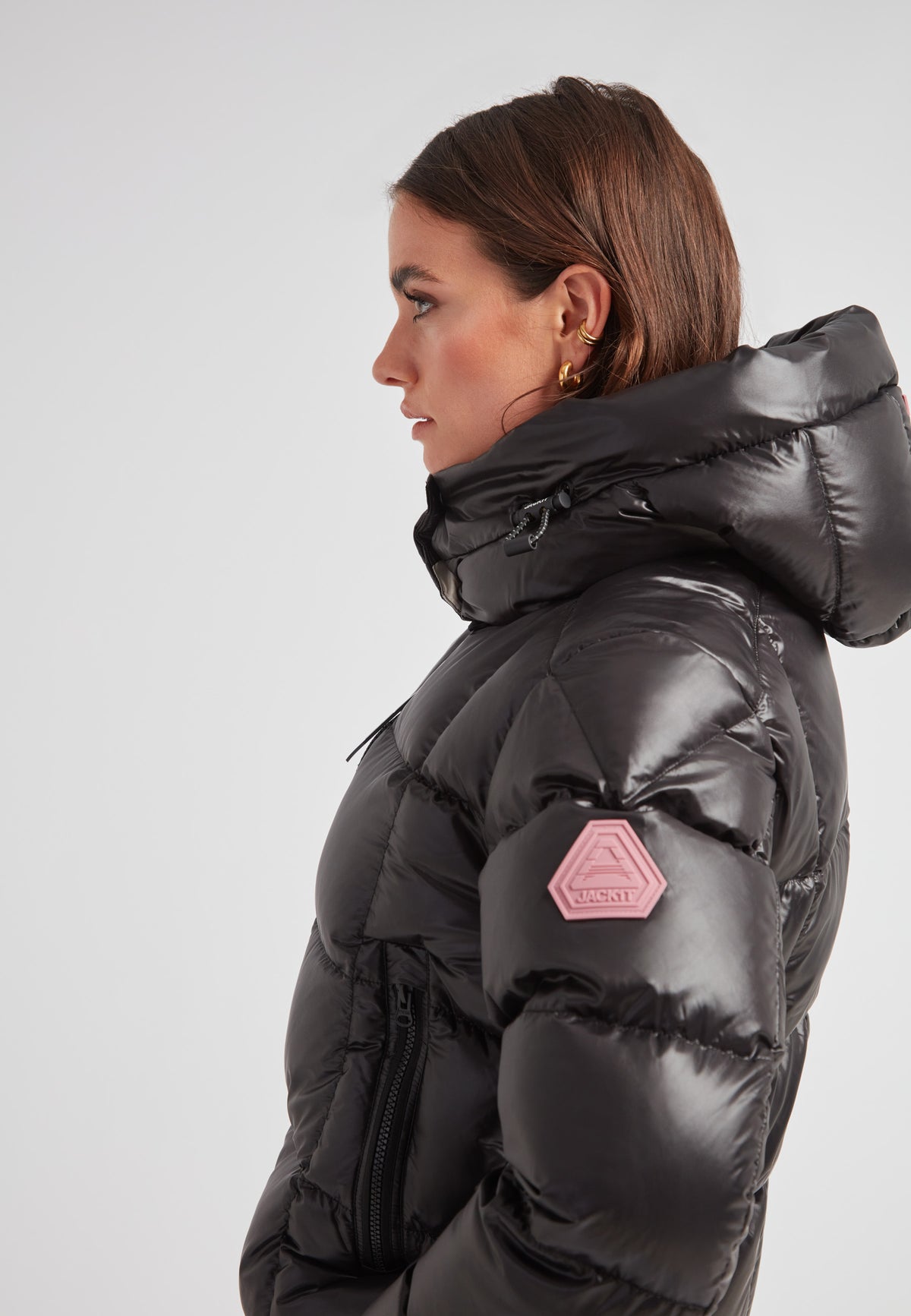 Side view of EZ Boxed Crop Down Puffer Jacket Lux Black showcasing its sleek design and hood.