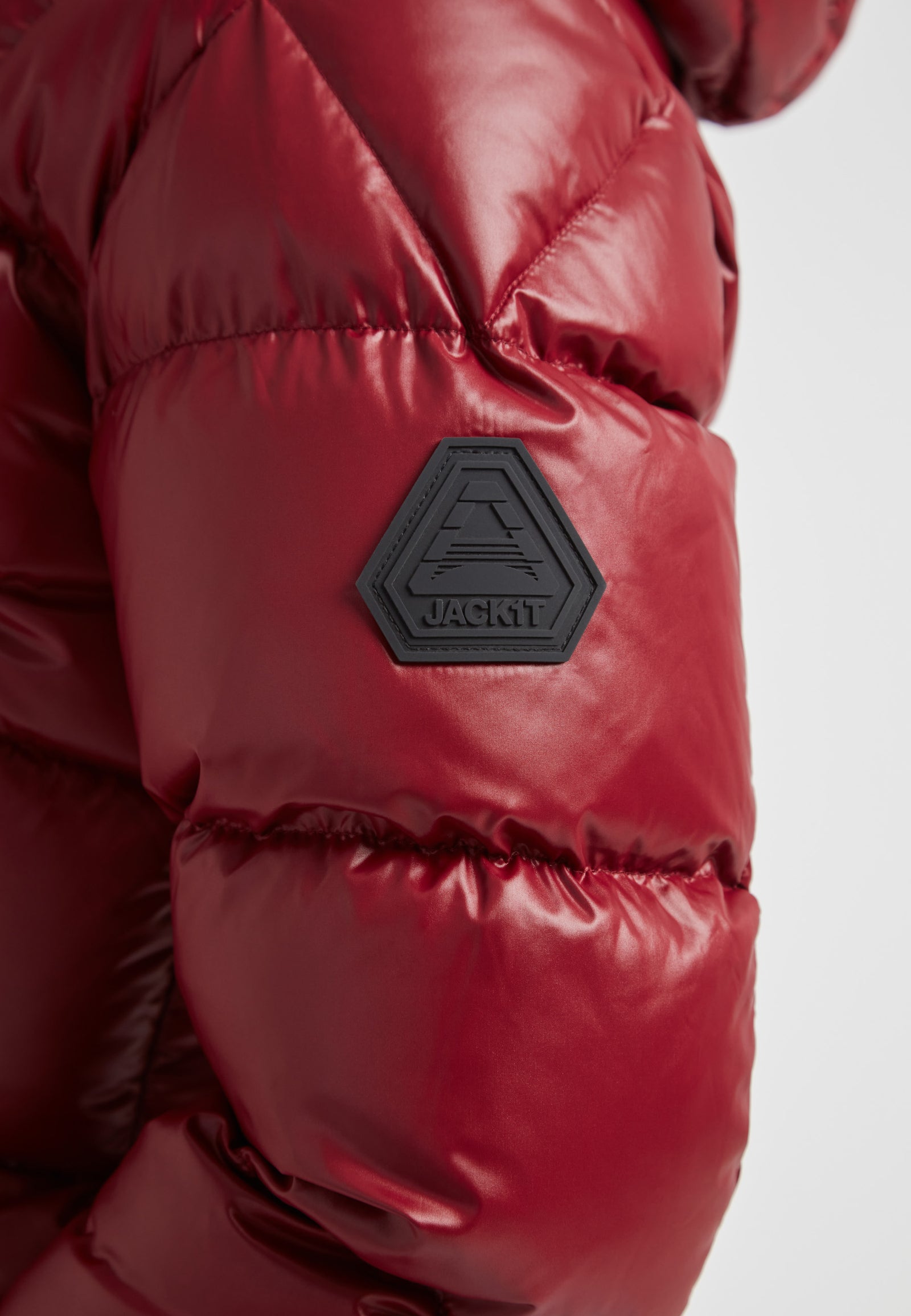 EZ Boxed Crop Down Puffer Jacket Lux Cranberry detailed view showcasing the jacket's bold crimson color and logo.