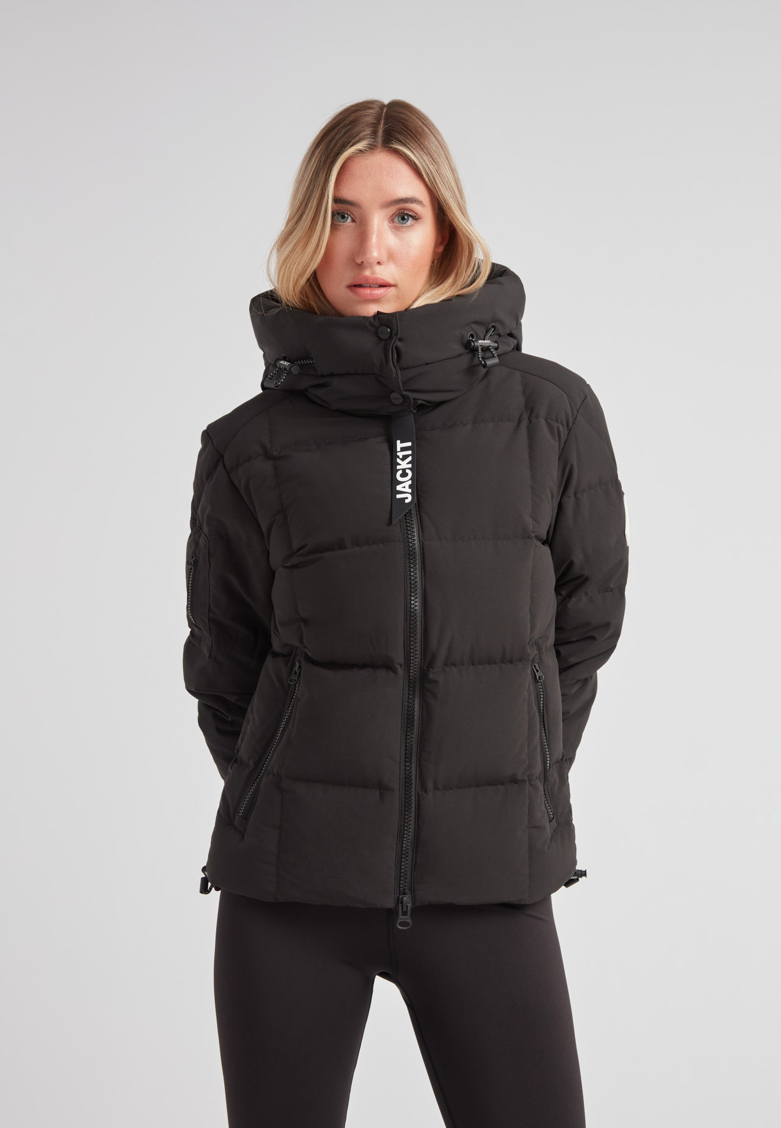 EZ Boxed Racer Down Puffer Jacket Matt Black displayed on model, showcasing sleek design and adjustable hood.