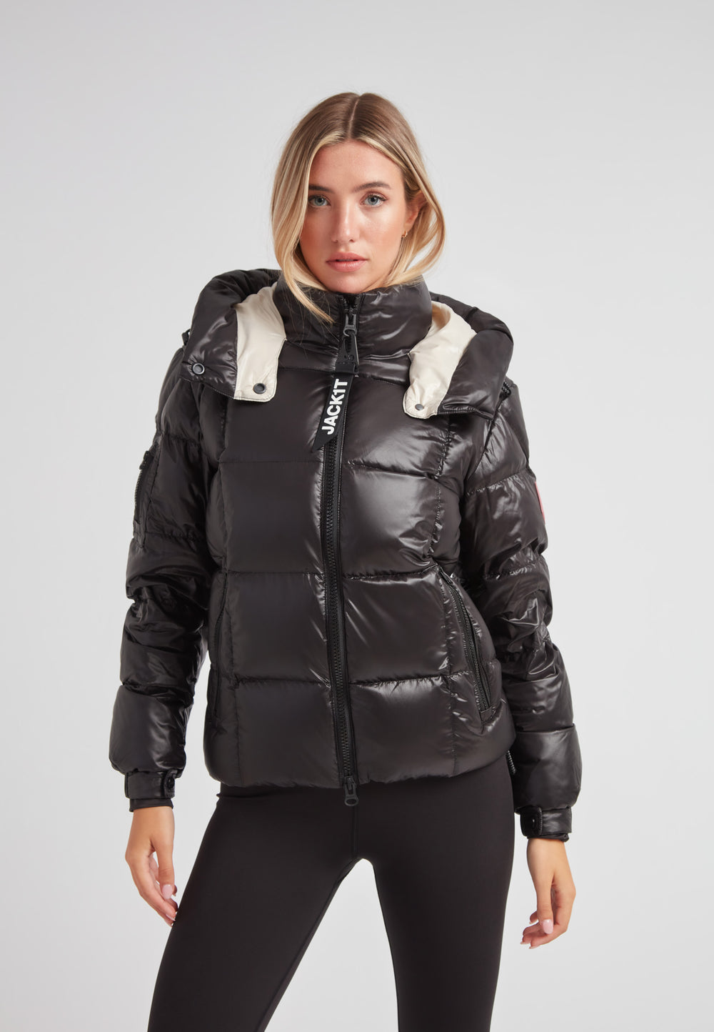 Model wearing the EZ Boxed Racer Down Puffer Jacket Lux Black, showcasing the stylish design and warmth for winter.