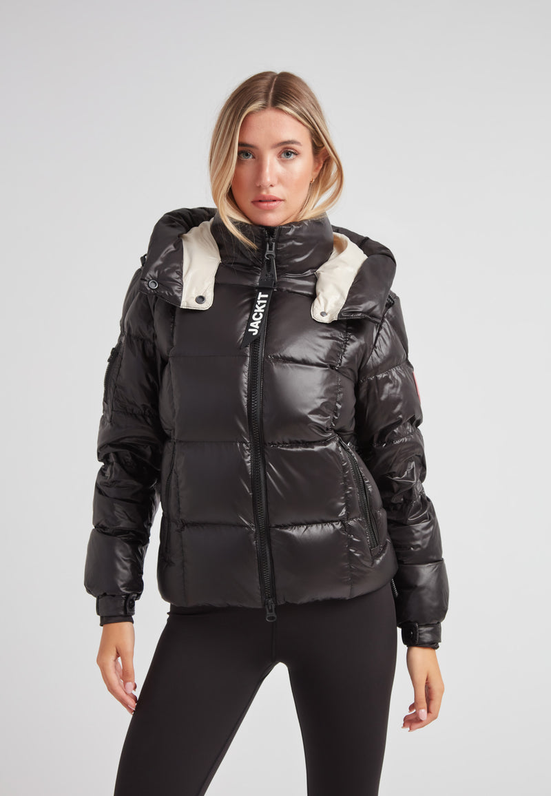 Model wearing the EZ Boxed Racer Down Puffer Jacket Lux Black, showcasing the stylish design and warmth for winter.