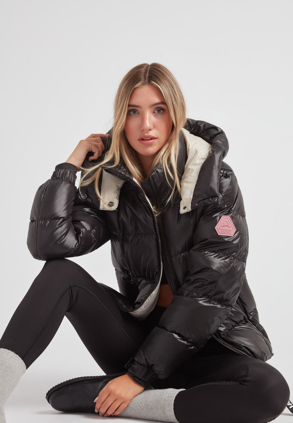 Model wearing EZ Boxed Racer Down Puffer Jacket Lux Black, showcasing modern utility and warmth in style.
