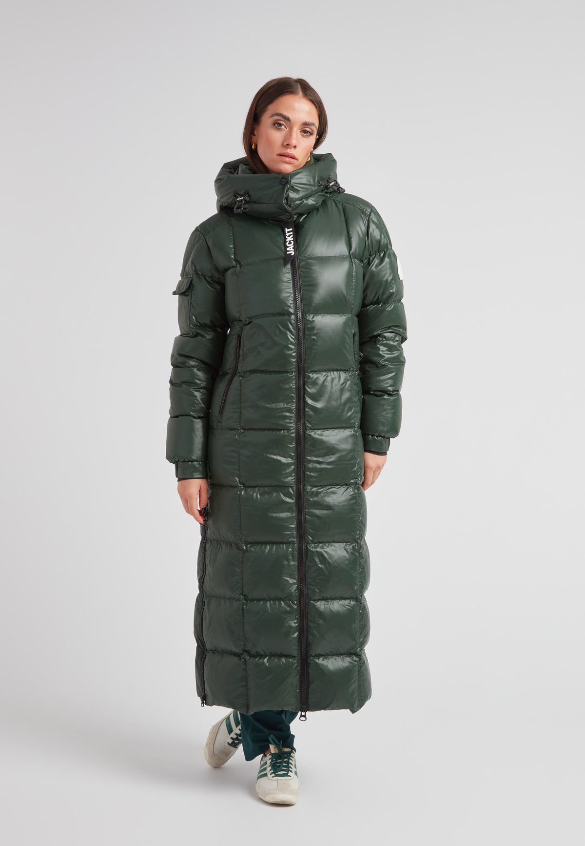 EZ Boxed Ultra Long Down Puffer Coat Lux Emerald on model, showcasing winter attire with modern design.