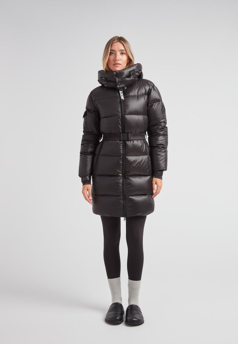 Model wearing EZ Belted Down Puffer Coat Lux Black, showcasing its sleek design and full-length warmth.