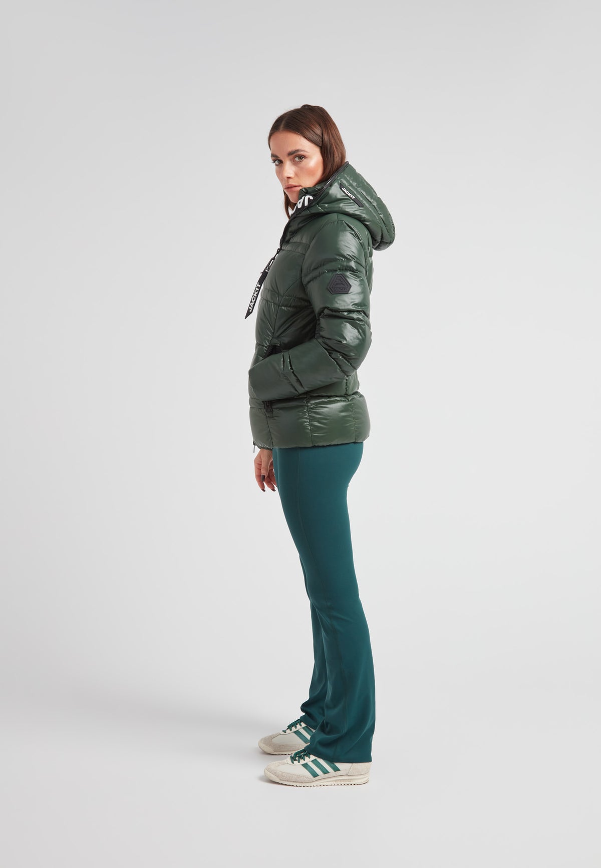 R4D Tramline Puffer Racer Jacket Lux Emerald side view on model, showcasing its sleek design and warmth.