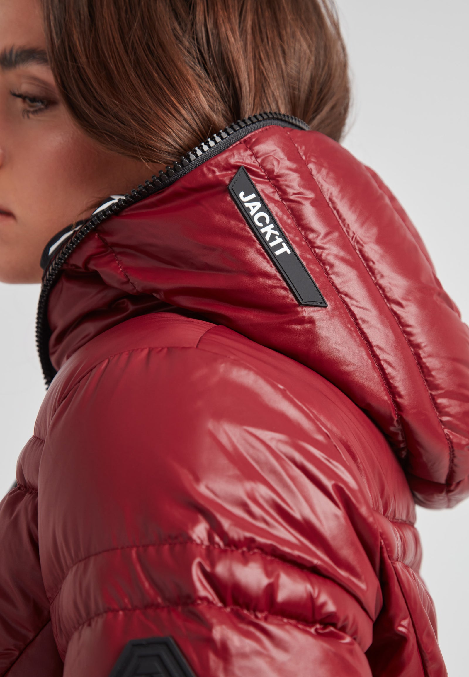 R4D Tramline Puffer Racer Jacket Lux Cranberry features a stylish hood and sleek jacket design by JACK1T.