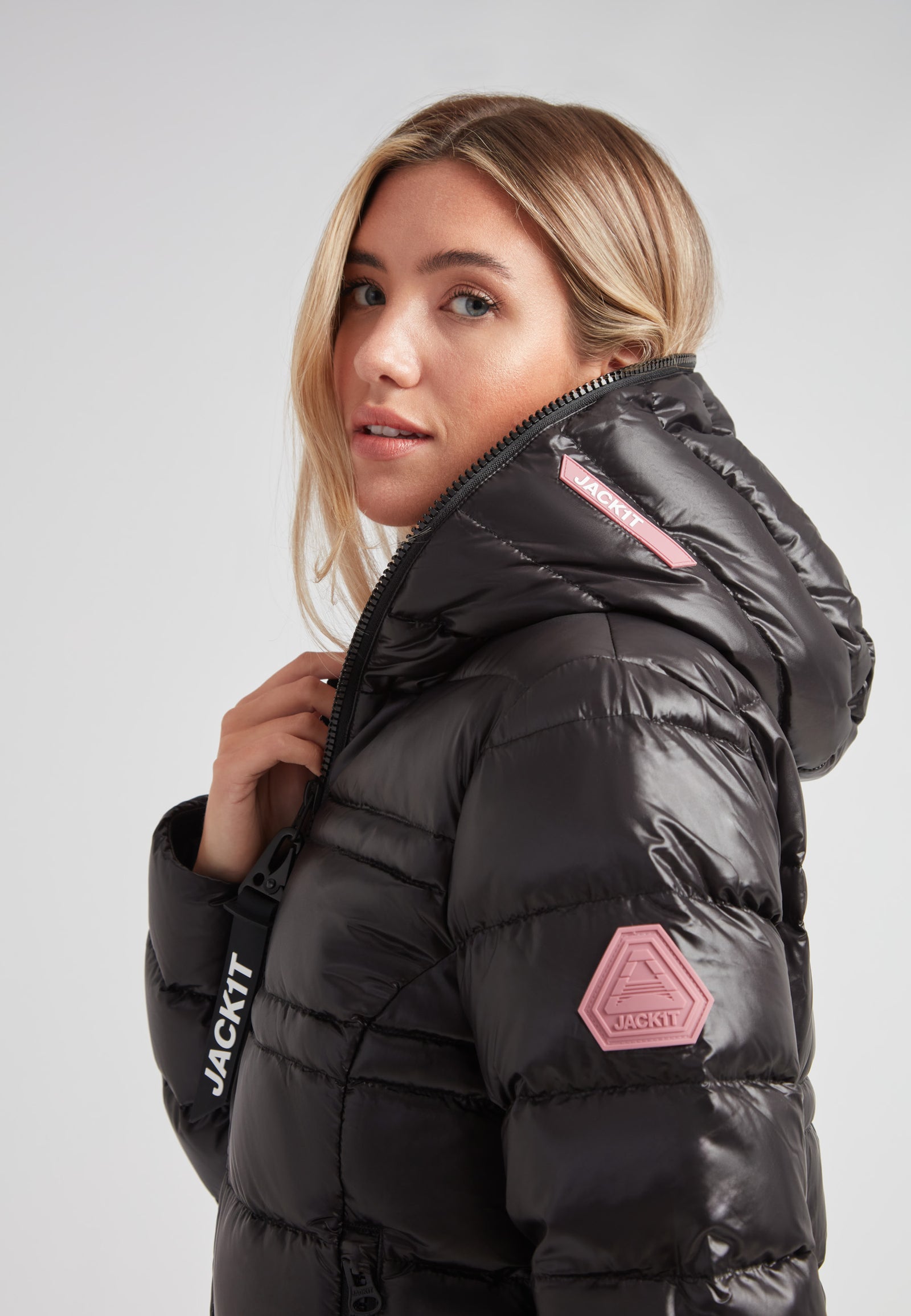 Model wearing the R4D Tramline Down Coat Lux Black showcasing its stylish design and insulation features.