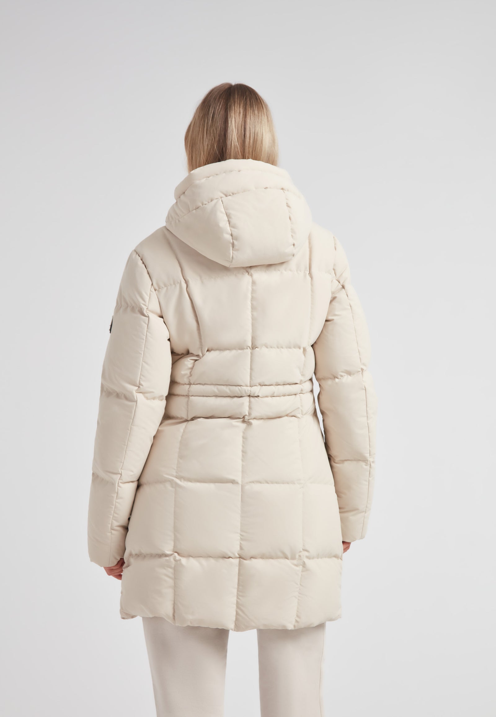 Back view of the Black Star Puffer Down Coat Stone showcasing its puffy design and adjustable waist.